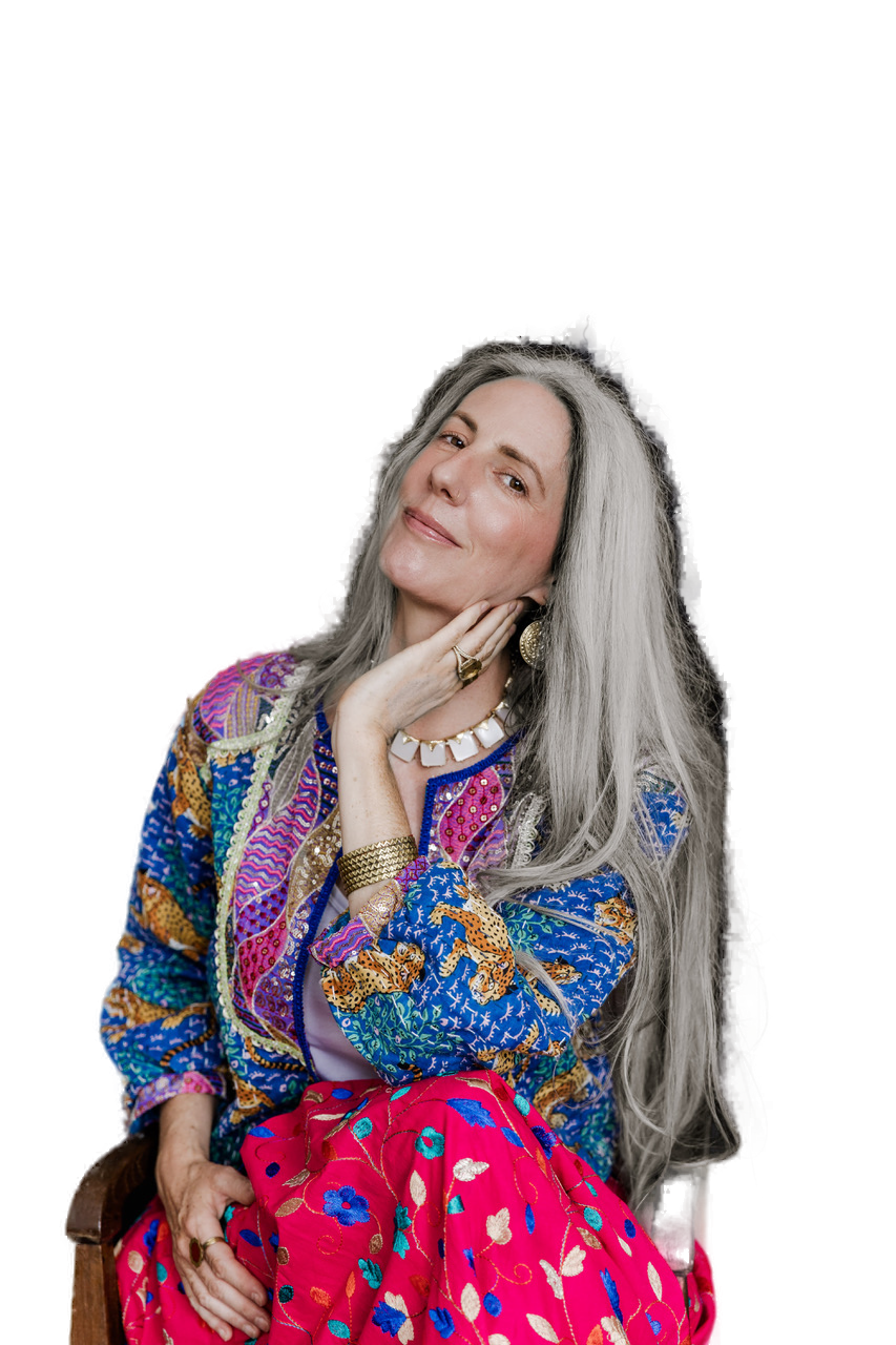 Helen Fehr in vibrant embroidered clothing, close-up portrait