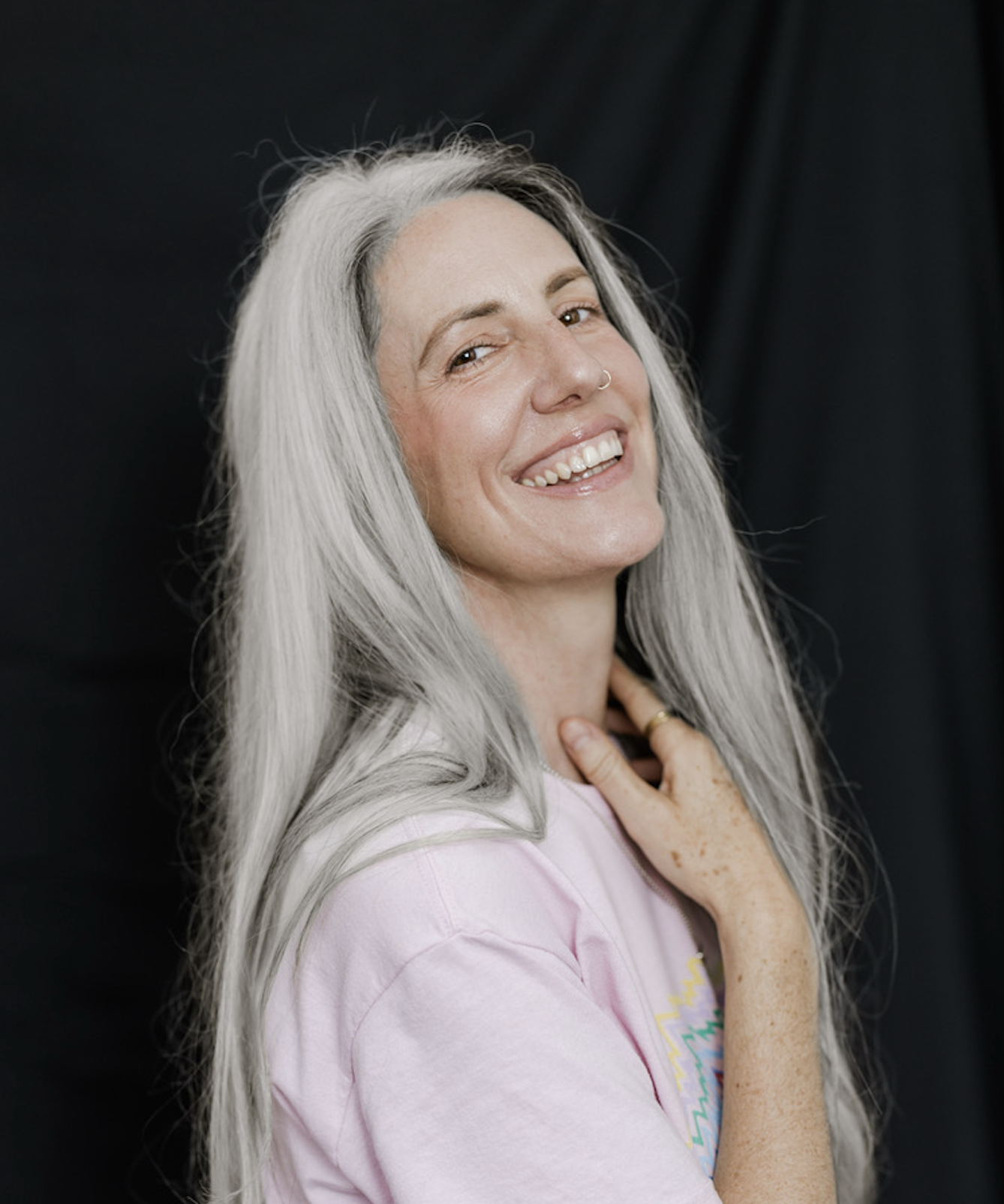 Helen Fehr smiling with silver hair